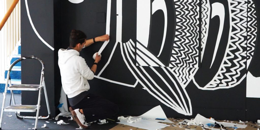 Fabio working on his artwork BIG FISH for UpFest2022