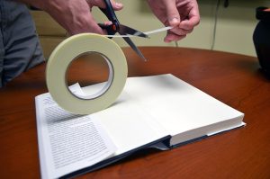 Pro® 99 being used to attach book cover