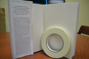 Pro® 99 being used to attach book cover